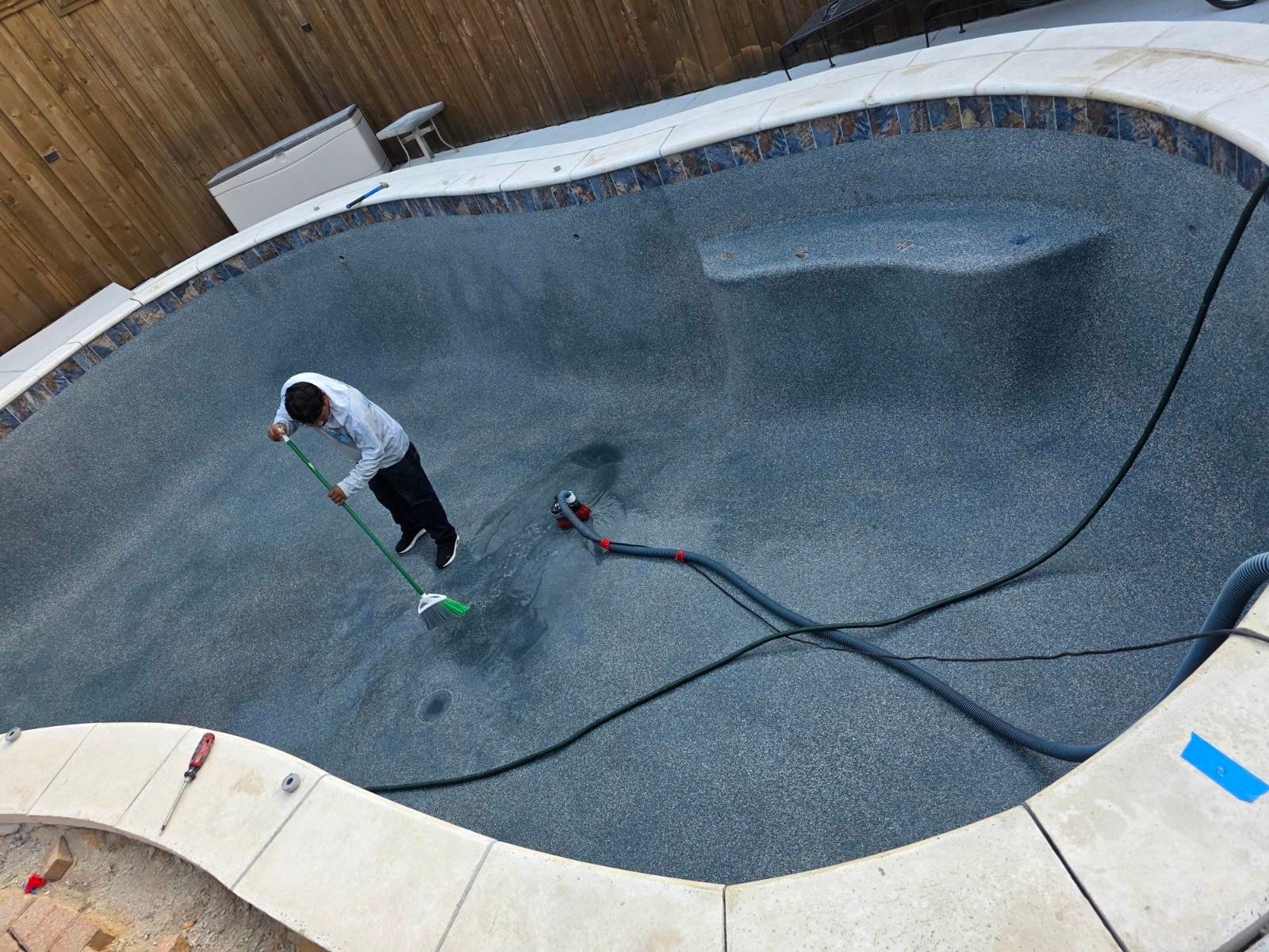 Pool professional testing water chemistry and inspecting filtration equipment with precision tools